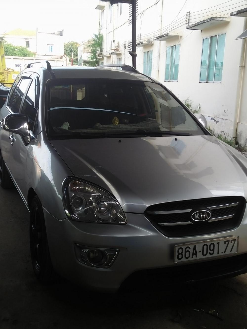 Kia Carens Lx 2010 - Bán xe Kia Carens LX đời 2010, màu bạc