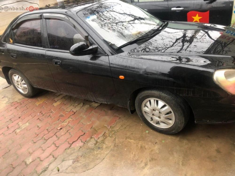 Daewoo Nubira II 2002 - Bán Daewoo Nubira II đời 2002, màu đen, giá 83tr