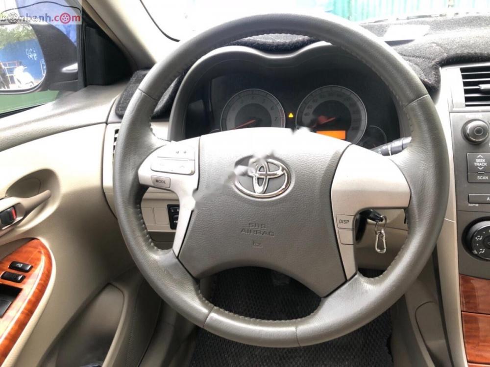 Toyota Corolla altis G 2009 - Gia đình cần bán chiếc xe Toyota Corolla Altis 1.8G sản xuất 2009