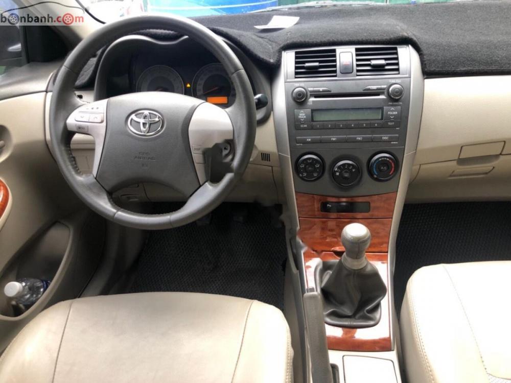 Toyota Corolla altis G 2009 - Gia đình cần bán chiếc xe Toyota Corolla Altis 1.8G sản xuất 2009