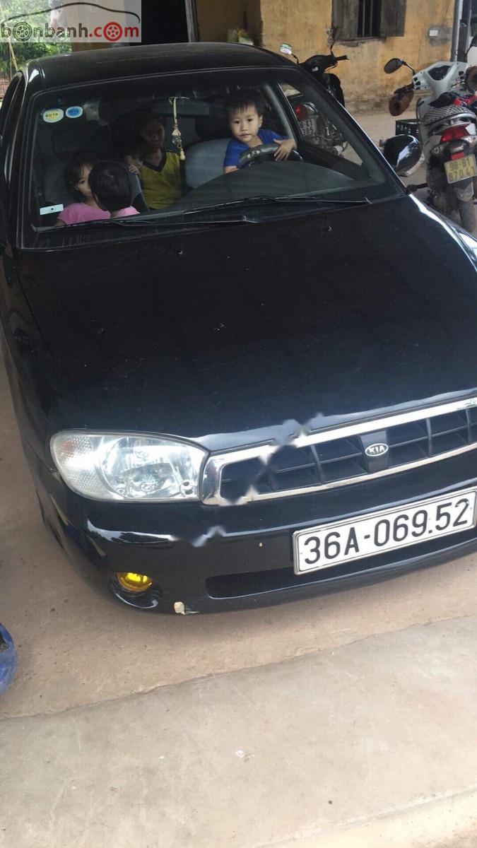 Kia Spectra 2003 - Cần bán lại xe Kia Spectra sản xuất 2003, màu đen còn mới, giá chỉ 120 triệu