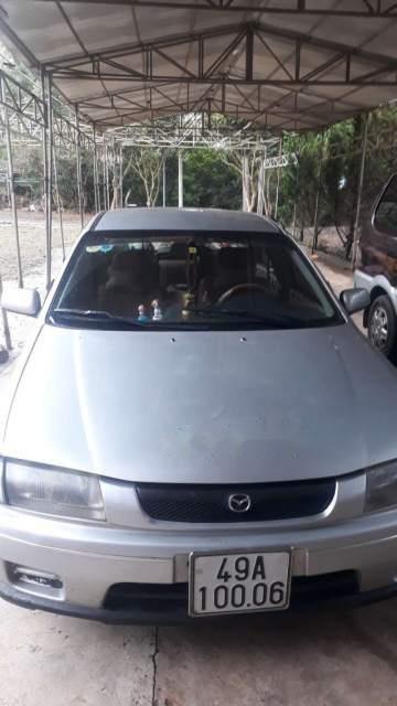 Mazda 323  MT 2000 - Bán xe Mazda 323 MT 2000, màu bạc, giá rẻ