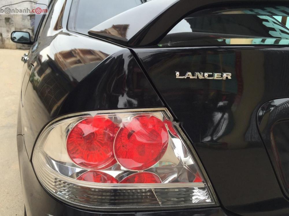 Mitsubishi Lancer 2.0 AT 2005 - Cần bán gấp Mitsubishi Lancer 2.0 AT sản xuất năm 2005, màu đen  