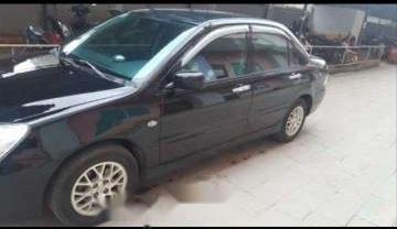 Mitsubishi Lancer 2004 - Bán xe Mitsubishi Lancer 2004, màu đen xe gia đình, 232 triệu