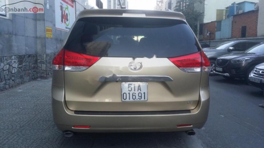 Toyota Sienna LE 3.5 2010 - Gia đình bán xe Toyota Sienna LE 3.5 năm sản xuất 2010, màu vàng, xe nhập