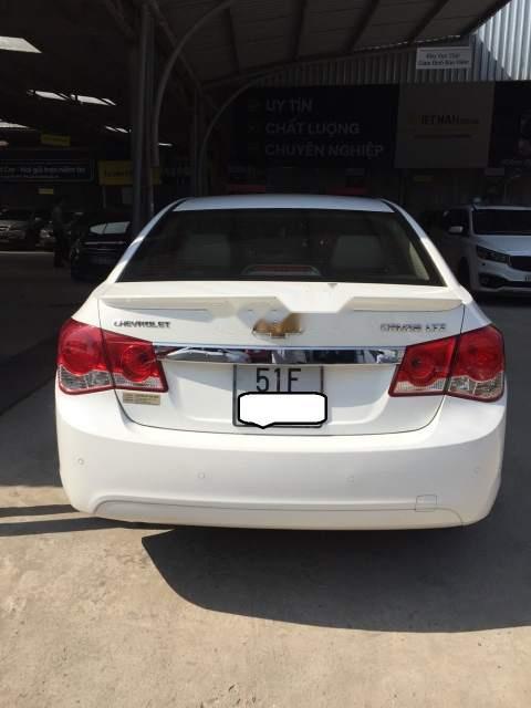 Chevrolet Cruze  1.8AT  2015 - Cần bán lại xe Chevrolet Cruze 1.8AT 2015, màu trắng như mới 