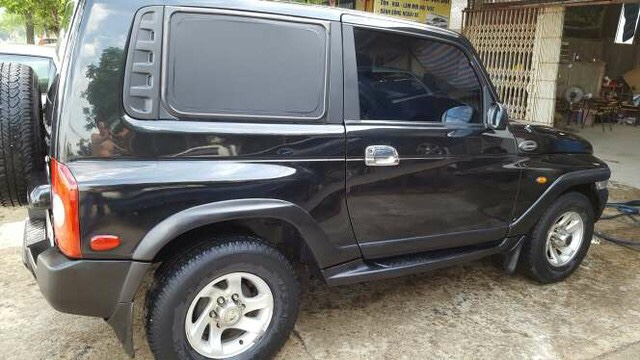 Ssangyong Korando TX5 2003 - Bán xe Ssangyong Korando TX5 đời 2009, màu đen, nhập khẩu