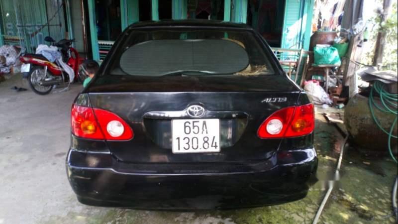 Toyota Corolla altis  MT 2003 - Cần bán lại xe Toyota Corolla Altis MT đời 2003, màu đen, xe nhà chạy rất kỹ