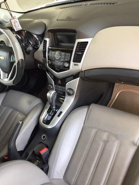 Chevrolet Cruze  1.8AT  2015 - Cần bán lại xe Chevrolet Cruze 1.8AT 2015, màu trắng như mới 