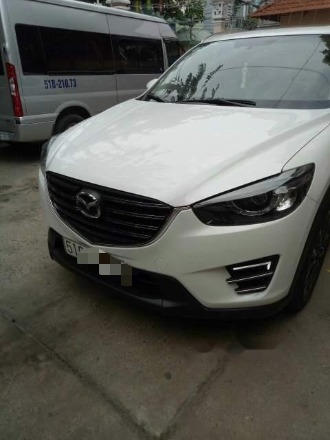 Mazda CX 5    2016 - Gia đình cần bán lại xe Mazda CX5 màu trắng Camay, mua hãng cuối 12/2016, hàng full thắng điện