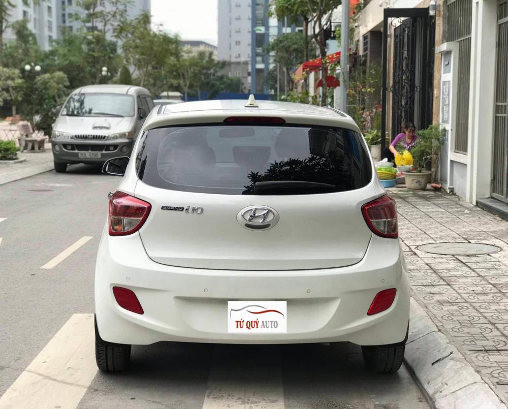 Hyundai Grand i10 2.0AT  2015 - Bán xe Hyundai Grand i10 1.0AT 2015, màu trắng, nhập khẩu