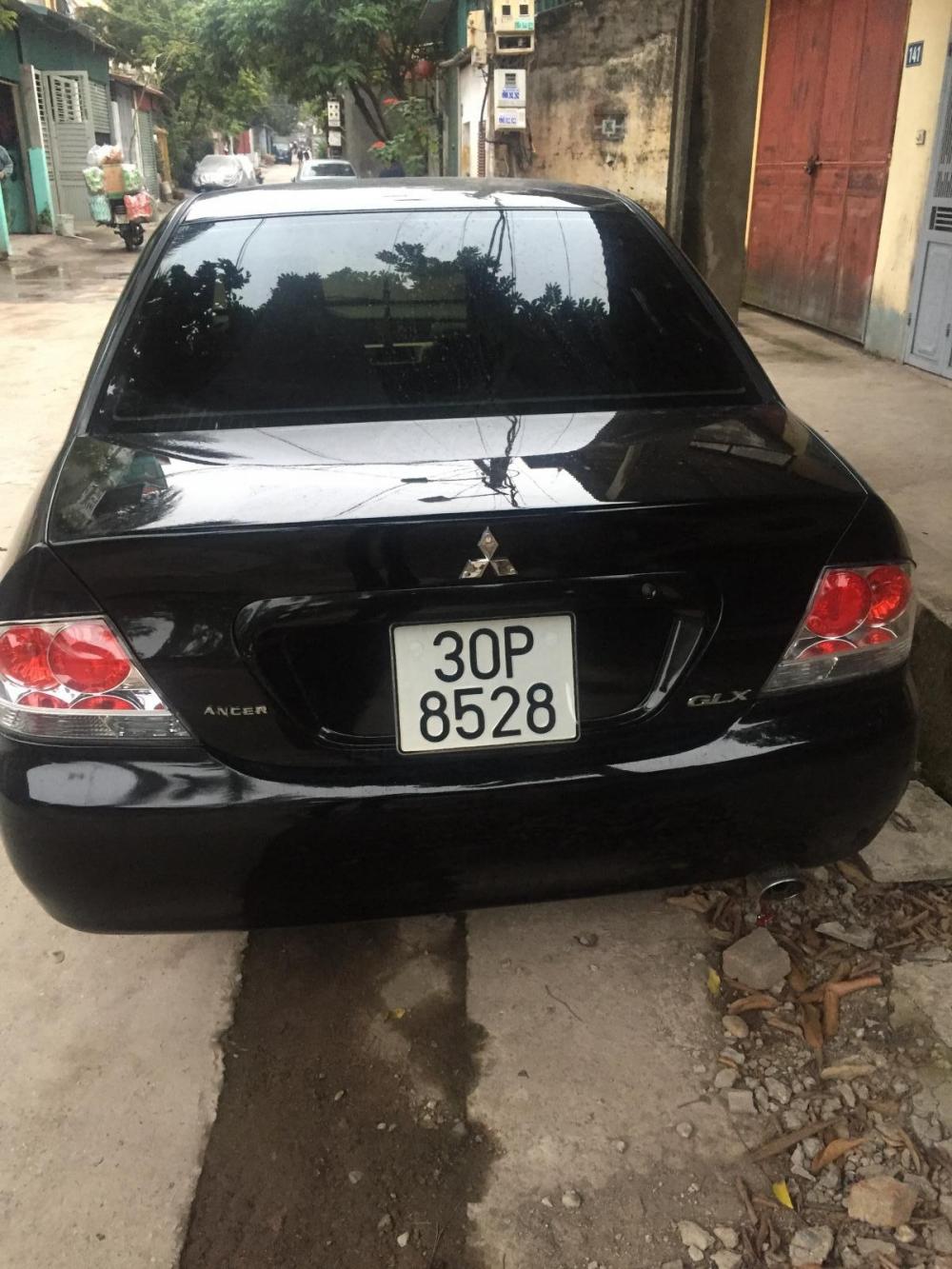 Mitsubishi Lancer 2004 - Cần bán xe Mitsubishi Lancer đời 2004, màu đen