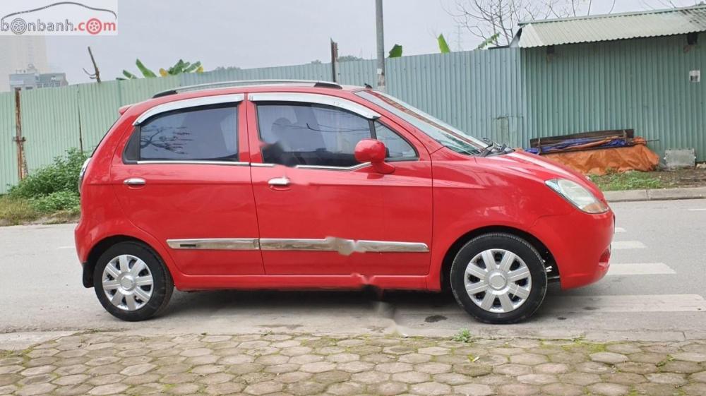 Chevrolet Spark AT 2011 - Cần bán lại xe Chevrolet Spark AT 2011, màu đỏ chính chủ giá cạnh tranh