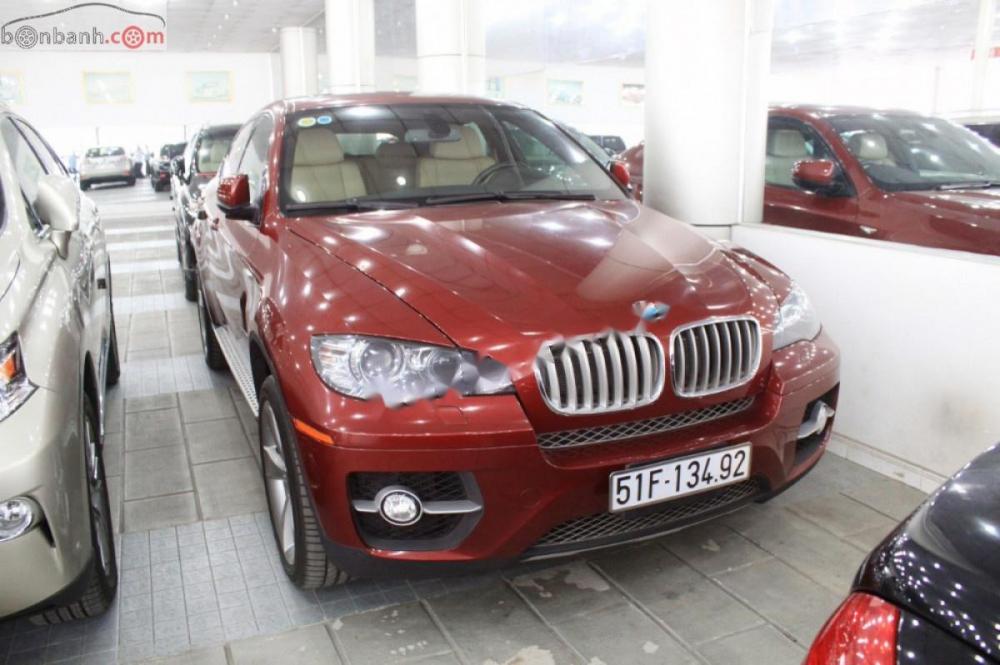 BMW X6 xDrive50i 2009 - Bán BMW X6 xDrive50i đời 2009, màu đỏ, xe nhập