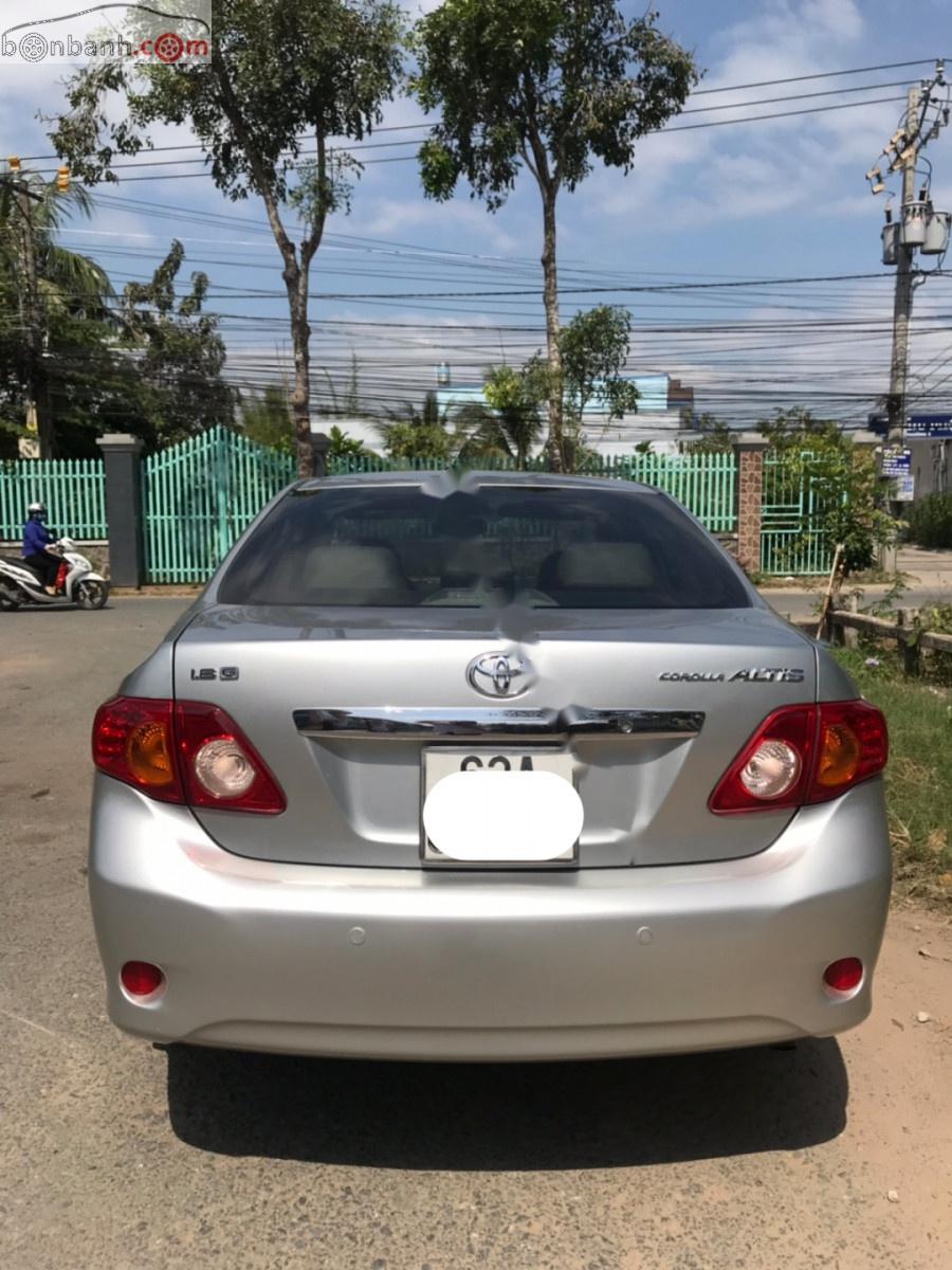 Toyota Corolla altis 1.8G 2009 - Bán xe Toyota Corolla altis 1.8G năm sản xuất 2009, màu bạc như mới, 409 triệu