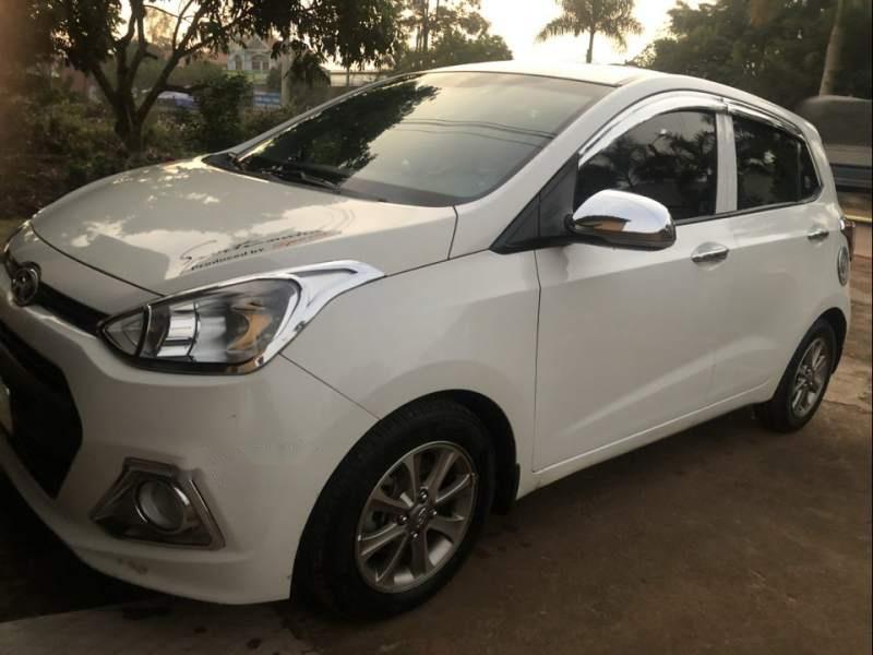 Hyundai Grand i10     MT 2015 - Bán Hyundai Grand i10 MT sản xuất năm 2015, màu trắng, đăng kí lần đầu T12-2015