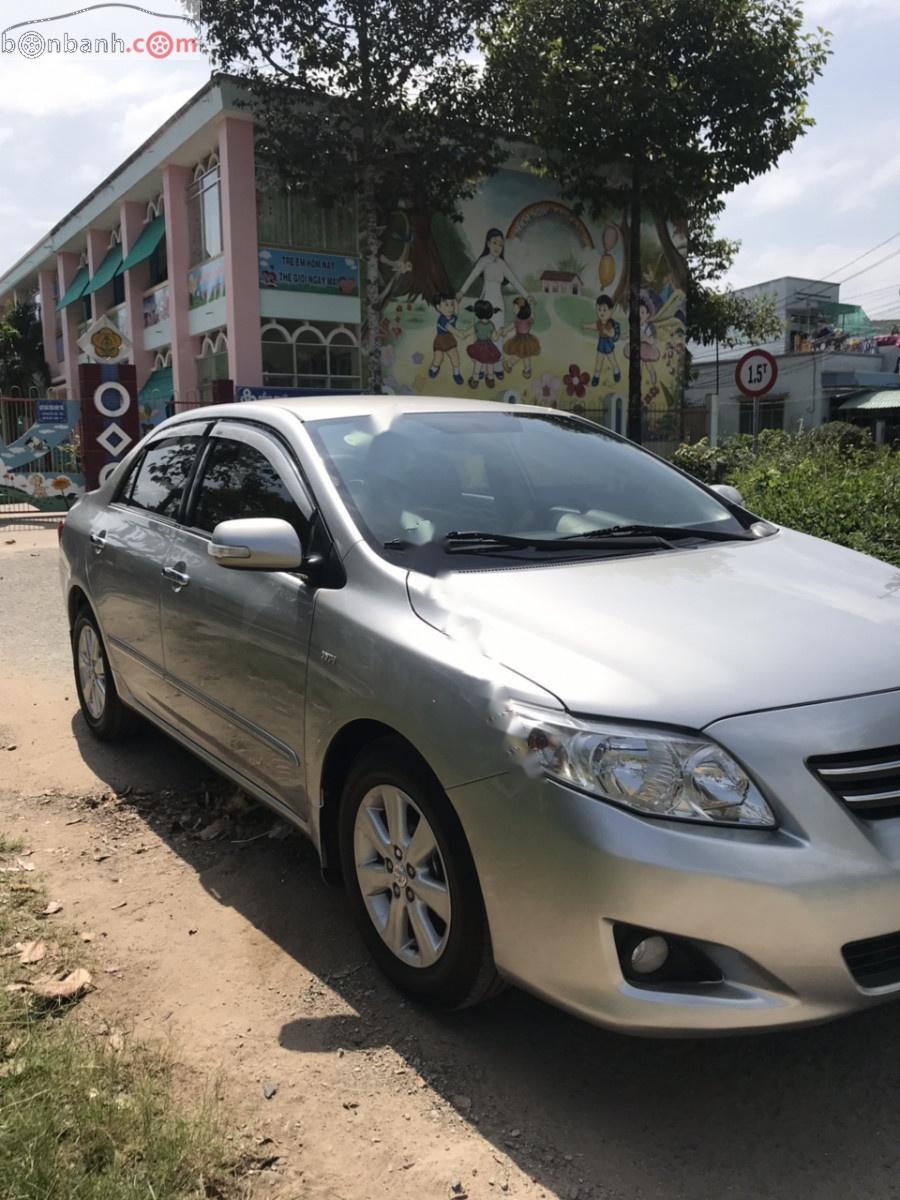 Toyota Corolla altis 1.8G 2009 - Bán xe Toyota Corolla altis 1.8G năm sản xuất 2009, màu bạc như mới, 409 triệu