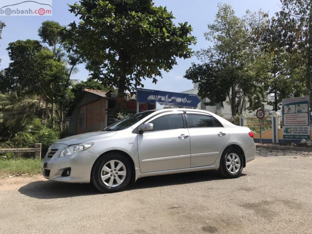 Toyota Corolla altis 1.8G 2009 - Bán xe Toyota Corolla altis 1.8G năm sản xuất 2009, màu bạc như mới, 409 triệu