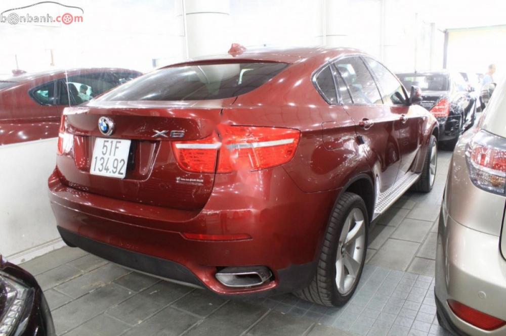 BMW X6 xDrive50i 2009 - Bán BMW X6 xDrive50i đời 2009, màu đỏ, xe nhập