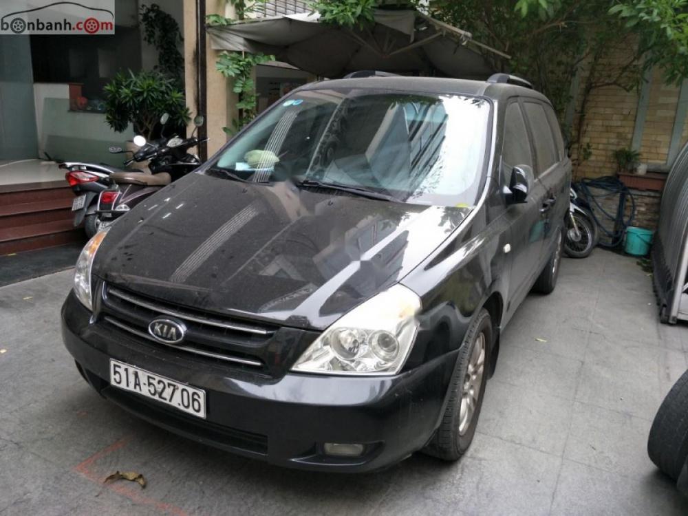 Kia Carnival EX 2.7 MT 2009 - Bán Kia Carnival 2.7 đời 2009, màu đen, nhập khẩu xe gia đình, 380tr