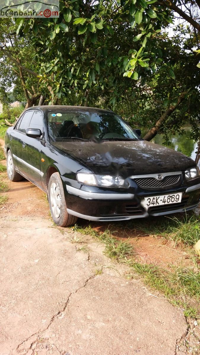 Mazda 626 2.0 MT 1999 - Cần bán Mazda 626 2.0 MT sản xuất 1999, màu đen, giá tốt