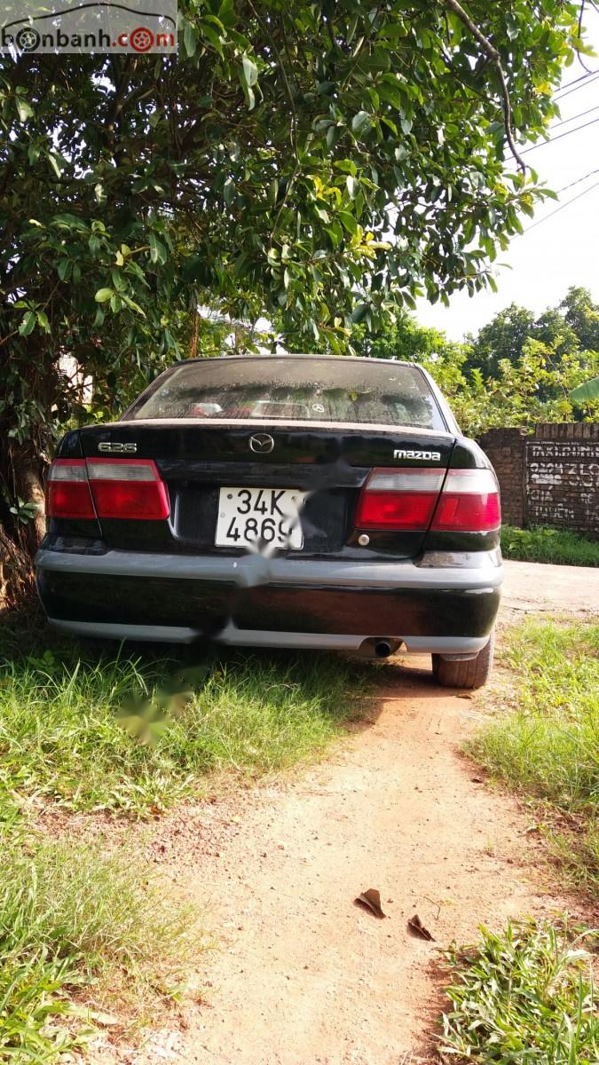 Mazda 626 2.0 MT 1999 - Cần bán Mazda 626 2.0 MT sản xuất 1999, màu đen, giá tốt