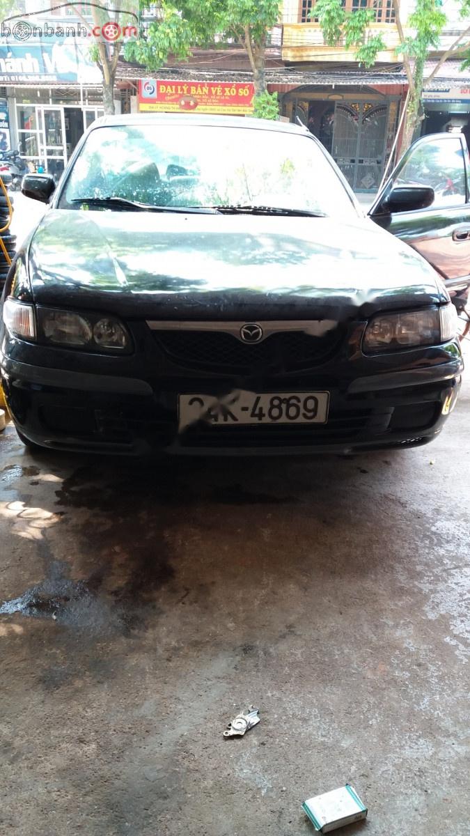 Mazda 626 2.0 MT 1999 - Cần bán Mazda 626 2.0 MT sản xuất 1999, màu đen, giá tốt