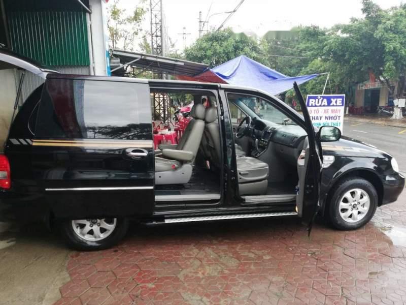 Kia Carnival  GS AT  2009 - Bán xe Kia Carnival GS AT đời 2009, màu đen, nhập khẩu 