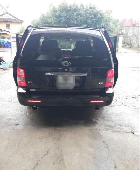 Kia Carnival  GS AT  2009 - Bán xe Kia Carnival GS AT đời 2009, màu đen, nhập khẩu 