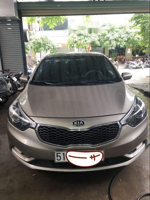 Kia K3 2014 - Bán Kia K3 năm 2014, màu vàng cát