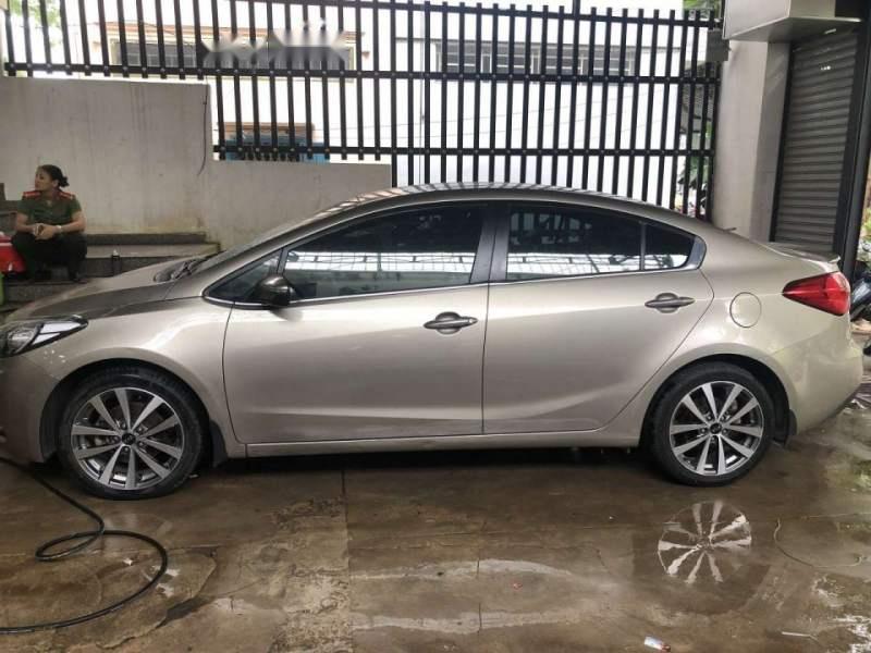 Kia K3 2014 - Bán Kia K3 năm 2014, màu vàng cát