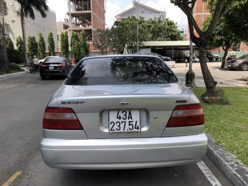 Nissan Bluebird  AT 2005 - Cần bán xe Nissan Bluebird AT năm sản xuất 2005, màu bạc, xe đẹp