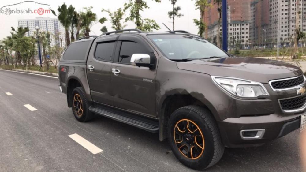 Chevrolet Colorado LTZ 2.8L 4x4 MT 2014 - Bán xe Chevrolet Colorado LTZ 2.8 - 4x4 màu nâu (Số sàn - máy dầu), ký lần đầu 6/2015