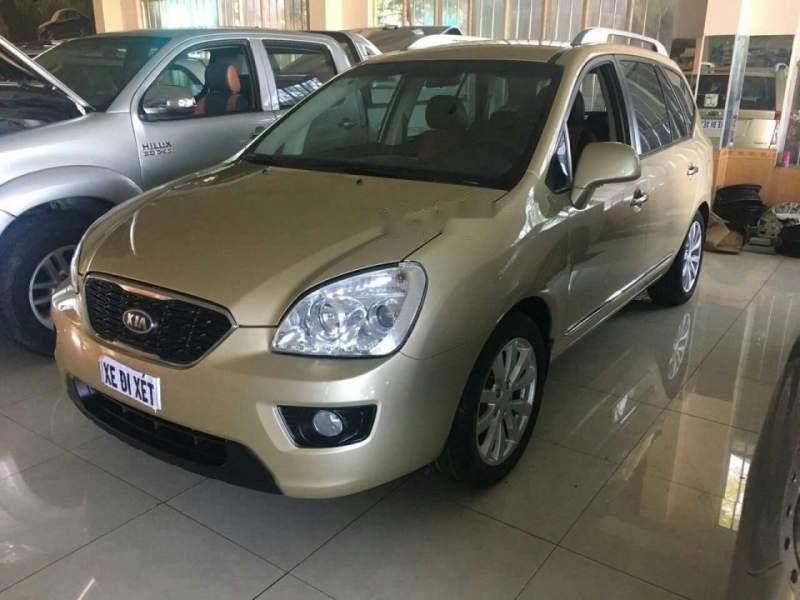 Kia Carens 2014 - Bán Kia Carens sản xuất 2014, màu vàng, 390 triệu