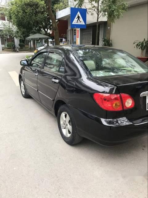 Toyota Corolla altis   2003 - Bán xe cũ Toyota Corolla altis năm 2003, màu đen