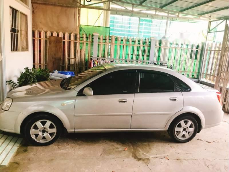 Daewoo Lacetti   2004 - Bán Daewoo Lacetti năm 2004, màu bạc, xe gia đình 