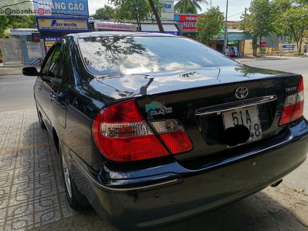 Toyota Camry 2004 - Cần bán Toyota Camry 2004, màu đen  