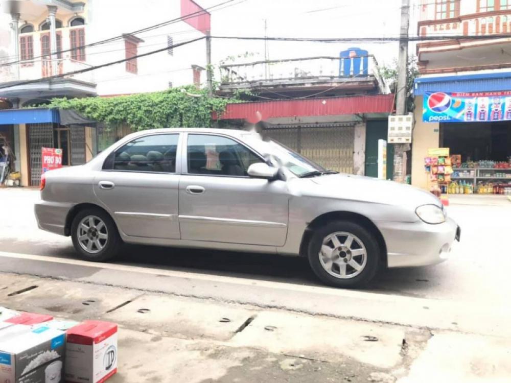 Kia Spectra 1.6 MT 2006 - Bán Kia Spectra 1.6 MT đời 2006, màu bạc, giá tốt