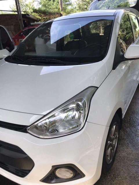 Hyundai Grand i10   2014 - Cần bán lại xe Hyundai Grand i10 đời 2014, màu trắng, nhập khẩu nguyên chiếc xe gia đình