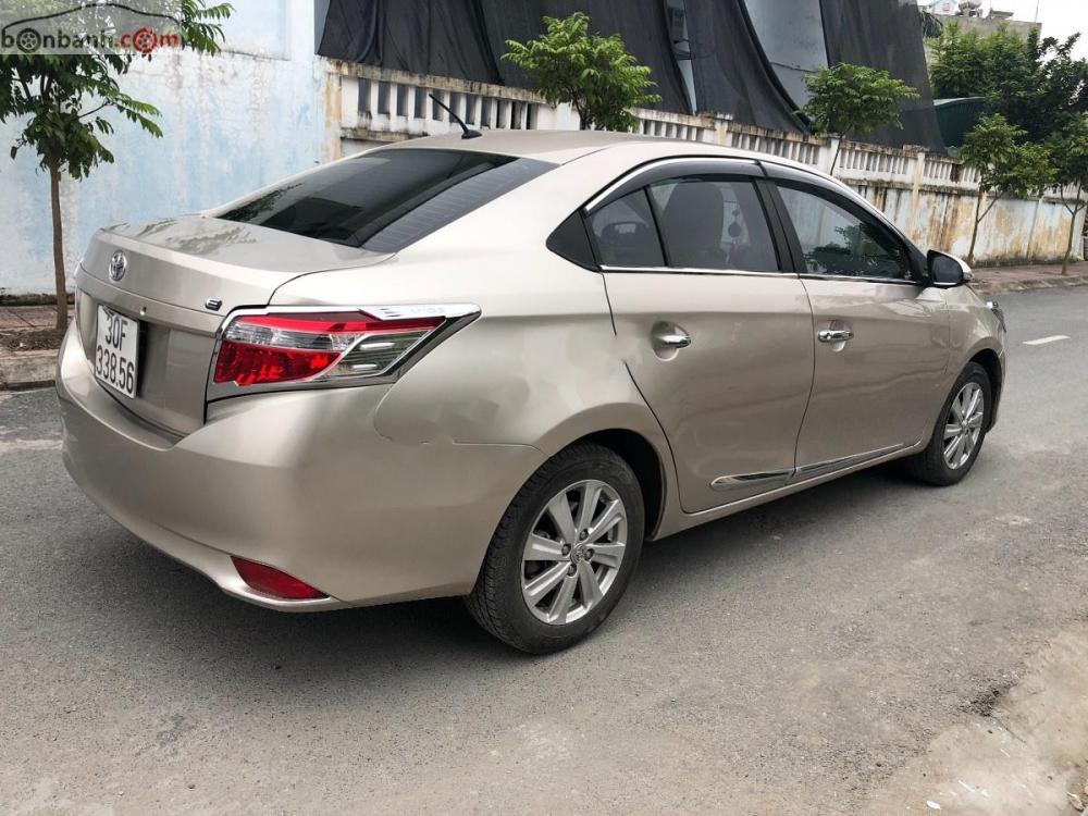 Toyota Vios 1.5 E 2015 - Bán xe Toyota Vios 1.5 E 2015, màu vàng, giá chỉ 420 triệu