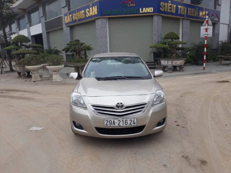 Toyota Vios  1.5 E 2011 - Bán xe Toyota Vios 1.5 E sản xuất 2011, màu vàng, số tự động