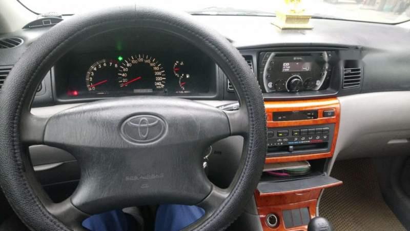 Toyota Corolla altis 2002 - Cần bán xe Toyota Corolla Altis đời 2002, màu bạc