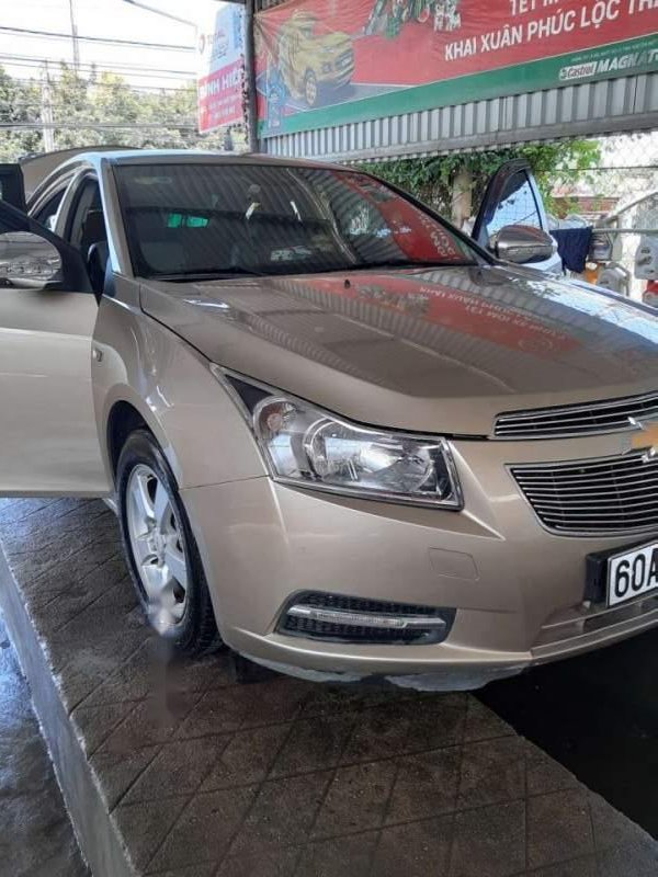 Chevrolet Cruze   2013 - Bán Chevrolet Cruze sản xuất 2013, màu vàng số sàn