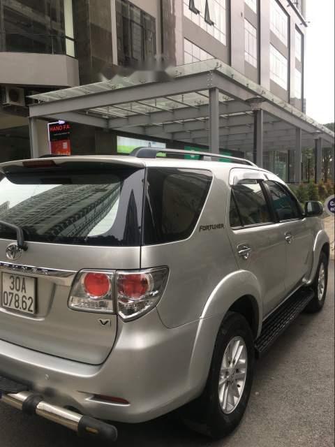 Toyota Fortuner 2013 - Cần bán Toyota Fortuner đời 2013, màu bạc chính chủ