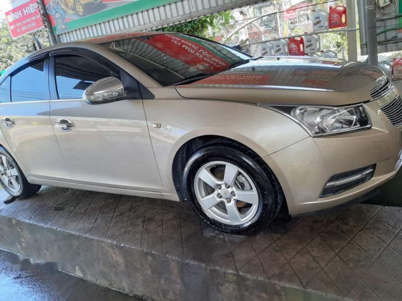 Chevrolet Cruze   2013 - Bán Chevrolet Cruze sản xuất 2013, màu vàng số sàn