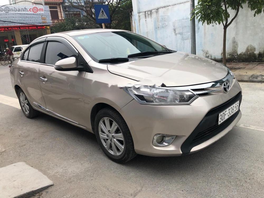 Toyota Vios 1.5 E 2015 - Bán xe Toyota Vios 1.5 E 2015, màu vàng, giá chỉ 420 triệu