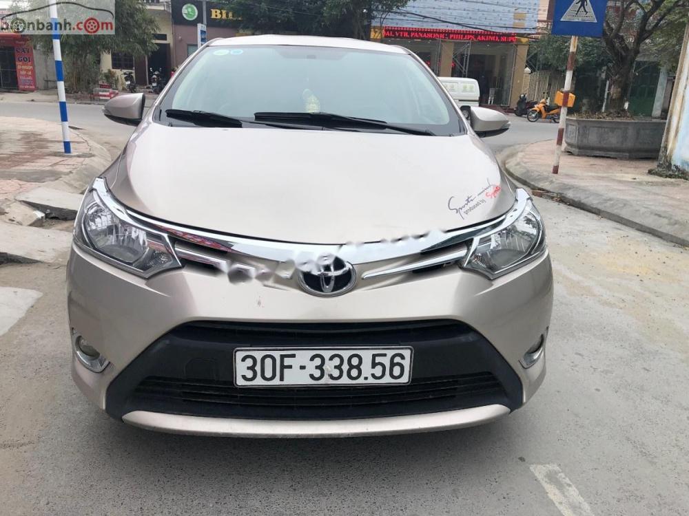 Toyota Vios 1.5 E 2015 - Bán xe Toyota Vios 1.5 E 2015, màu vàng, giá chỉ 420 triệu