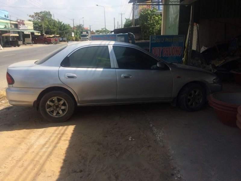 Mazda 323 2000 - Bán xe Mazda 323 năm sản xuất 2000, màu bạc giá cạnh tranh