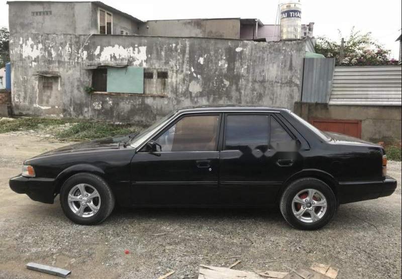 Mazda 626 1986 - Cần bán gấp Mazda 626 đời 1986, màu đen, xe nhập còn mới