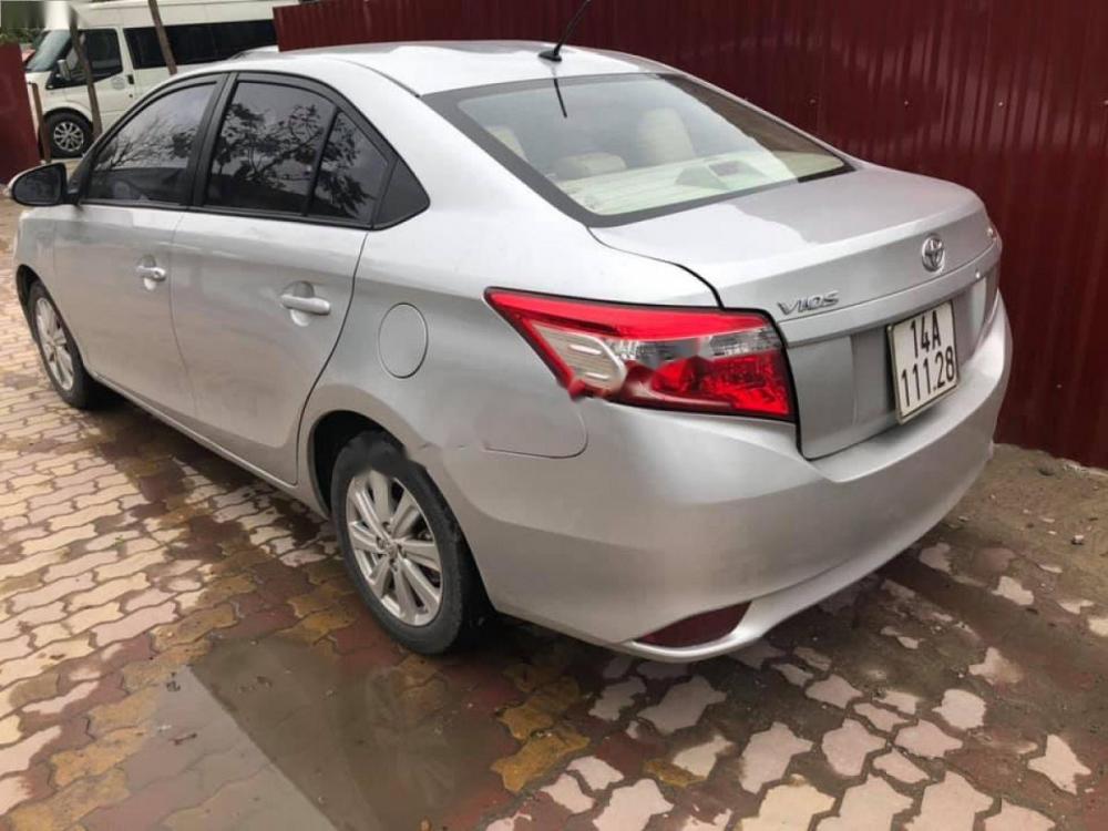 Toyota Vios 1.5E 2014 - Bán Toyota Vios 1.5E đời 2014, màu bạc như mới